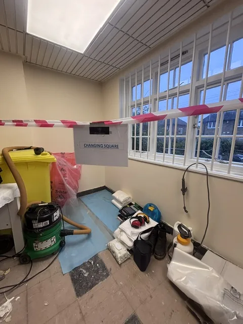 Asbestos floor tile and bitumen removal in Poplar